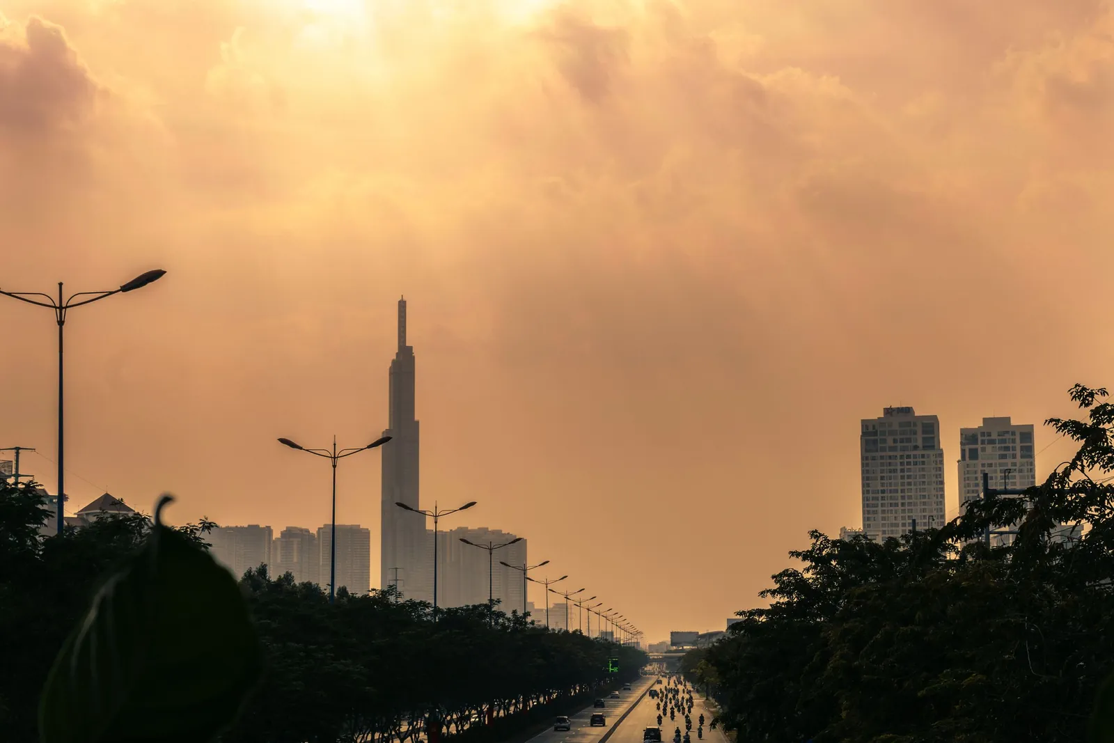 Golden sunset light over the Ho Chi Minh City skyline