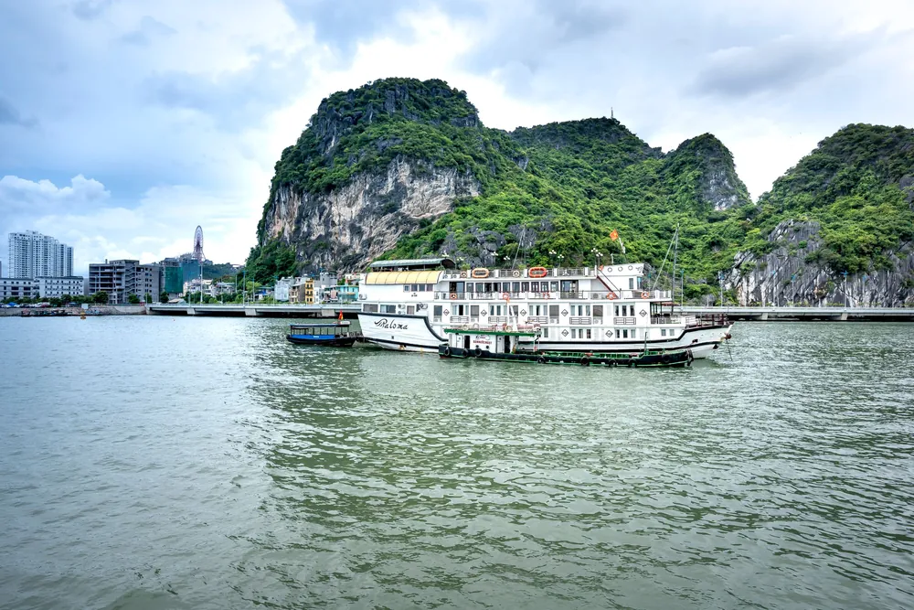 Boats among the limestone cliffs of Ha Long Bay