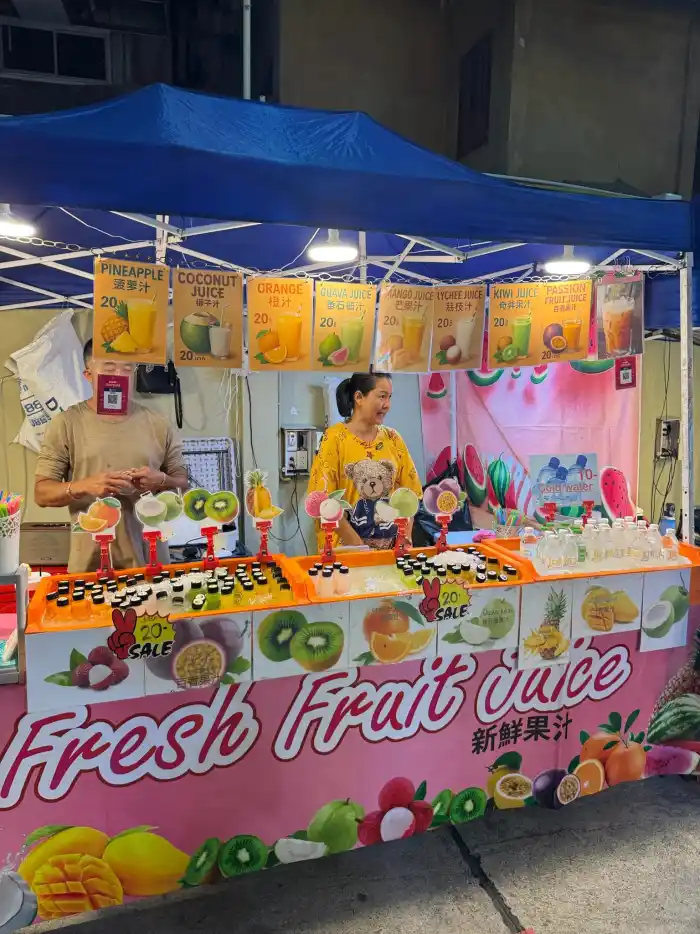 Sipping on the sweetness of nature's bounty at a vibrant market