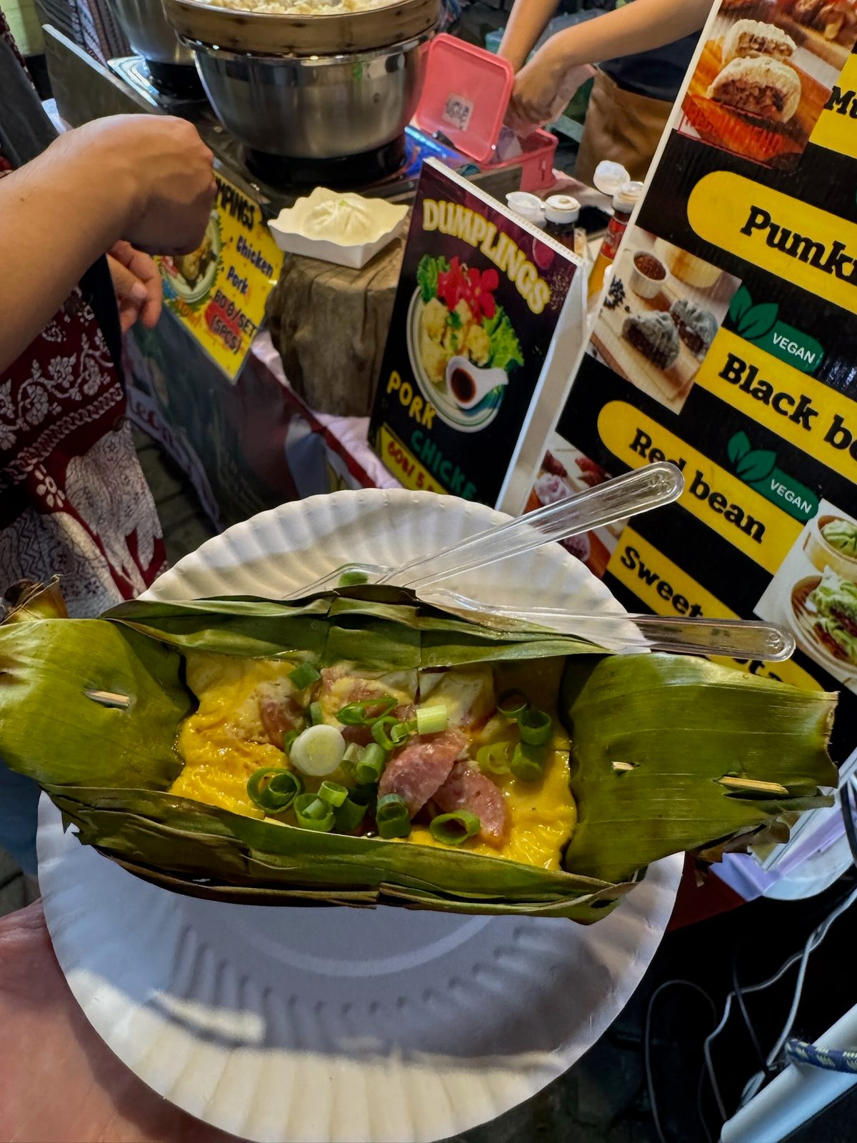 Street food served on a banana leaf at a roadside stall in Thailand